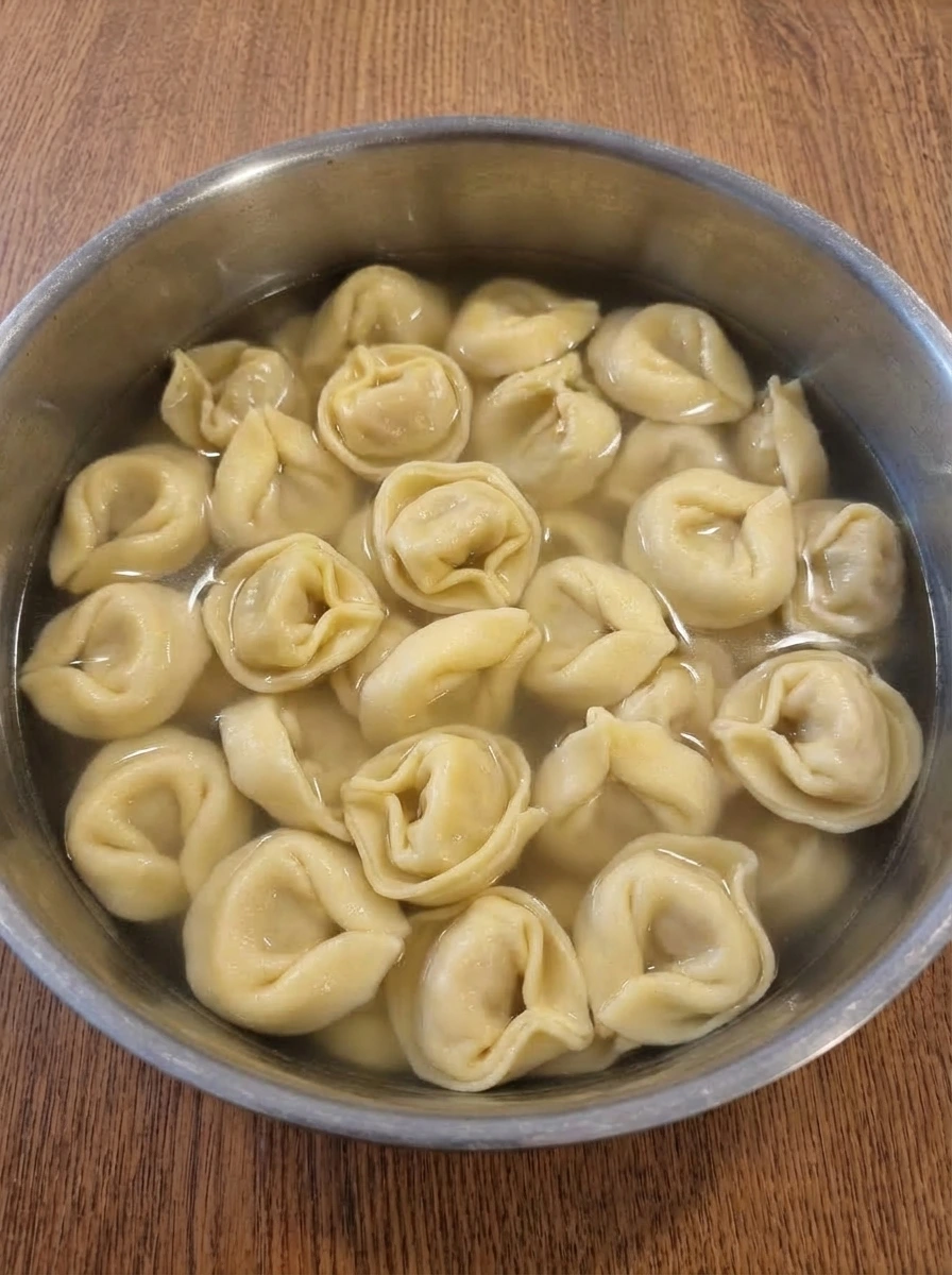 Tender tortellini cooking for Garlic Steak Tortellini