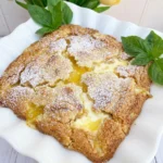 Lemon Cream Cheese Dump Cake with golden topping and creamy lemon filling