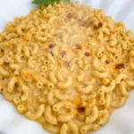 Crockpot Mac and Cheese Velveeta creamy elbow macaroni with melted cheese sauce Recipe focus: crockpot mac and cheese recipe velveeta.