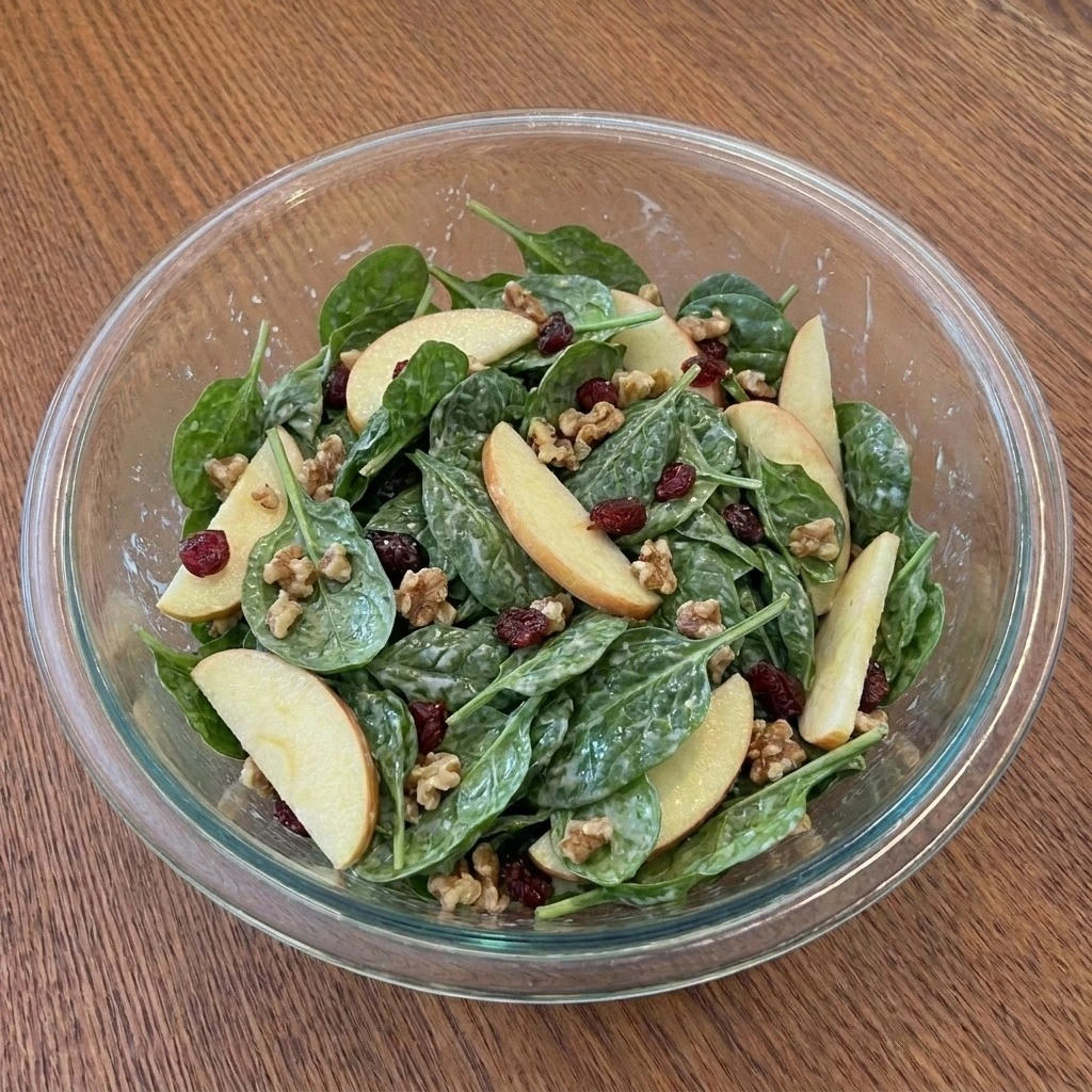 Fall Fruit Salad Thanksgiving Sides ingredients folded together with creamy dressing
