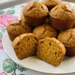Spice Cake Pumpkin Muffins with golden cracked tops and soft pumpkin crumb Recipe focus: pumpkin muffins with spice cake.