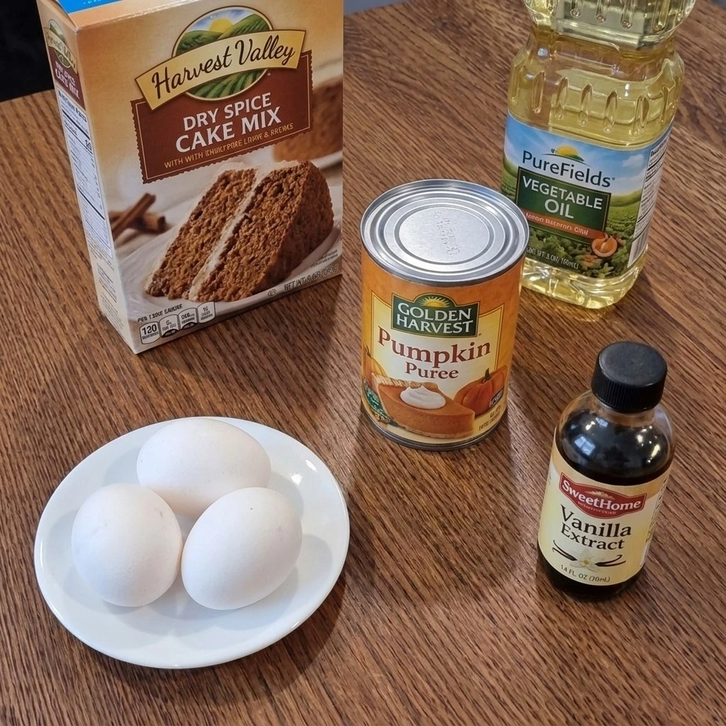 Spice Cake Pumpkin Muffins ingredients including pumpkin and spice cake mix Recipe focus: spice cake and pumpkin muffins.