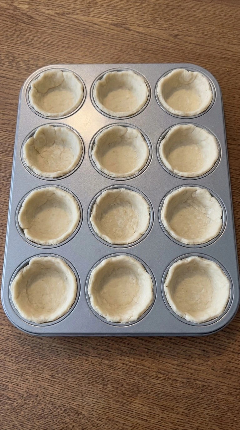 Shape the mini pie shells Recipe focus: friendsgiving pie party.