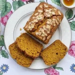 Almond Flour Pumpkin Bread golden homemade loaf with sliced pumpkin bread texture Recipe focus: pumpkin bread with almond flour.