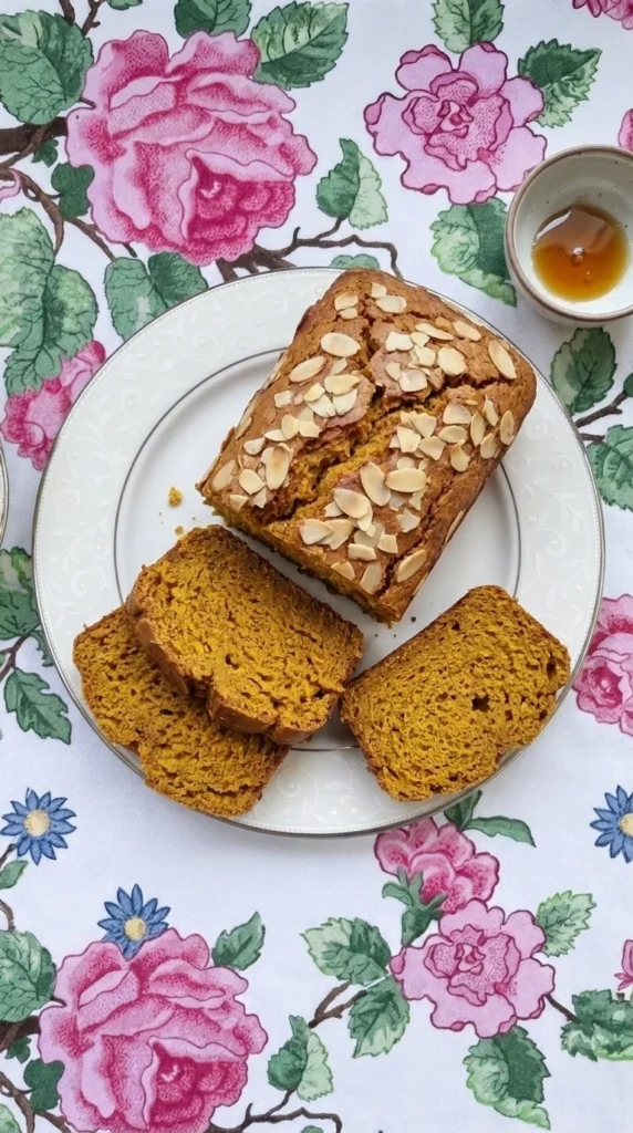 Almond Flour Pumpkin Bread golden homemade loaf with sliced pumpkin bread texture Recipe focus: pumpkin bread with almond flour.