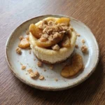 Apple Crisp Mini Cheesecake portions with golden crumb topping and apple layers Recipe focus: mini apple crisp cheesecake.