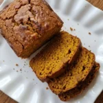 Brown Butter Pumpkin Bread loaf with golden crust and sliced pumpkin crumb Recipe focus: brown butter pumpkin bread recipe.