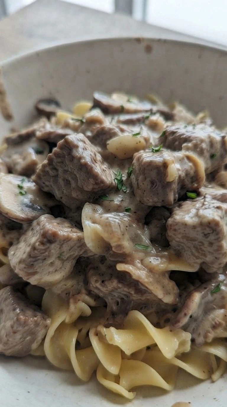Crockpot Beef Stroganoff creamy mushroom sauce with tender beef and noodles Recipe focus: beef stroganoff crockpot.
