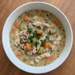 Crockpot Chicken and Wild Rice Soup with shredded chicken, wild rice and vegetables in creamy broth Recipe focus: chicken and wild rice soup crockpot.
