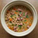 Crockpot Ham and Bean Soup with creamy Great Northern beans, smoked ham and carrots in a lightly thickened Recipe focus: ham and bean soup recipes crockpot.