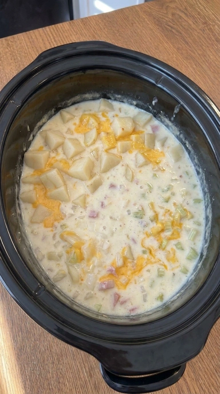 Crockpot Potato Soup creamy ham and cheese mixture during slow cooking Recipe focus: potato soup crock pot.