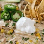 Crockpot White Chicken Chili in a bowl with creamy broth and shredded chicken Recipe focus: chicken chili recipe.