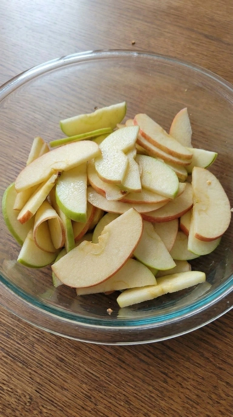Fall Apple Salad step with thin Honeycrisp and Granny Smith apple slices coated in lemon juice Recipe focus: apple salad recipe easy.