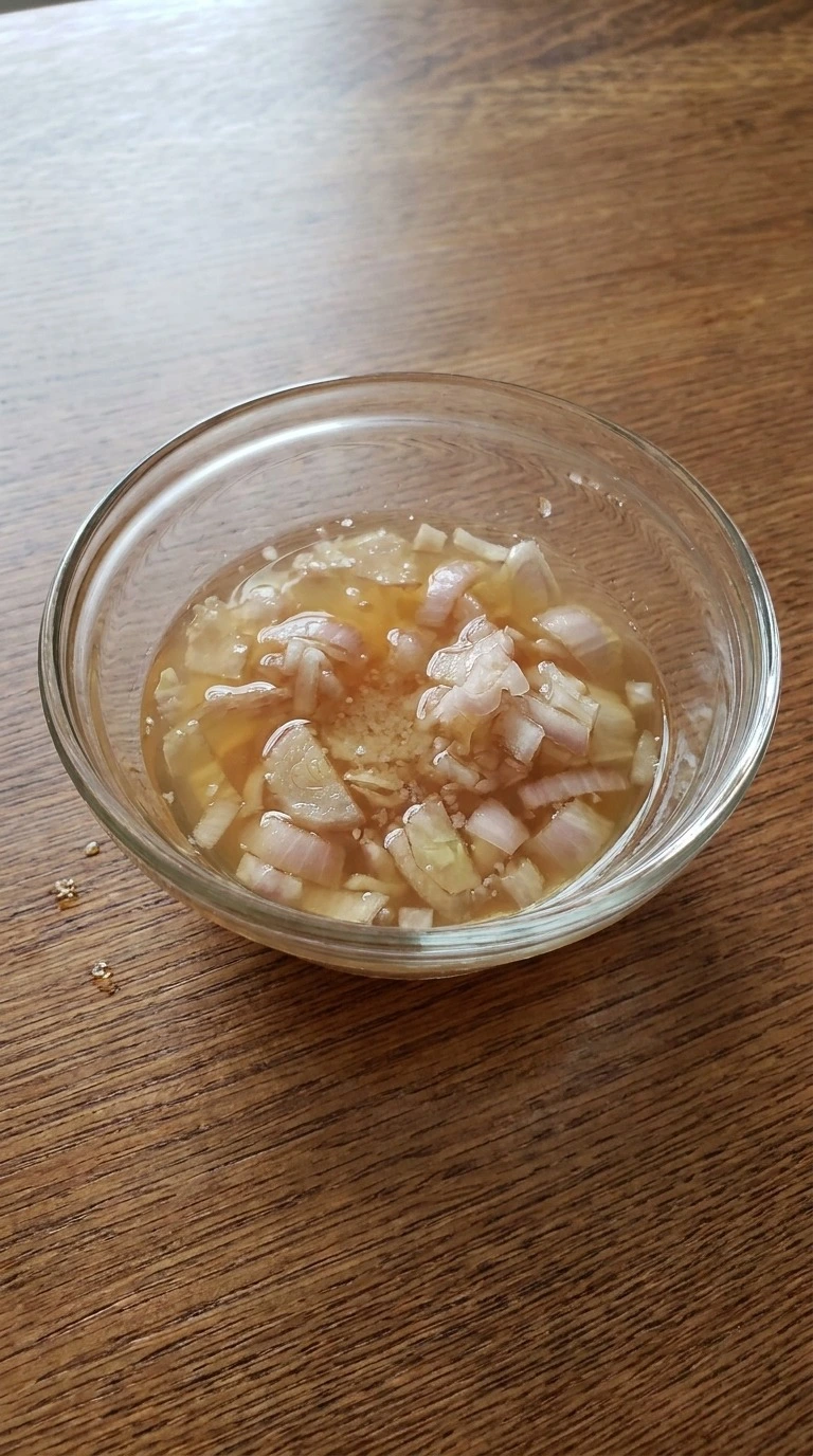 Fall Salad Dressing step with minced shallot softening in apple cider vinegar and kosher salt Recipe focus: fall salads for a crowd.