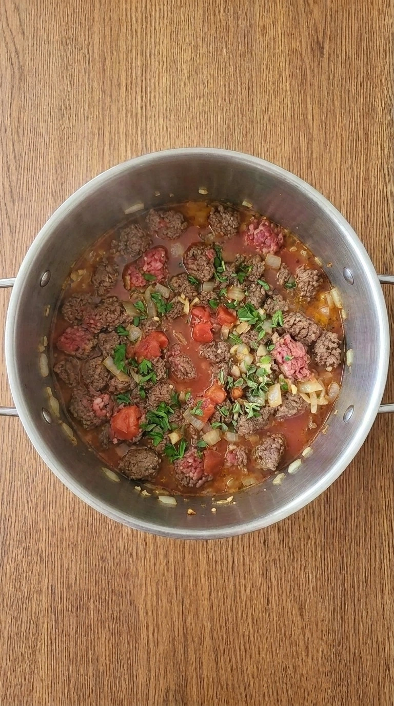One Pot Lasagna Soup tomato broth simmering with beef and herbs Recipe focus: lasagna soup recipe.