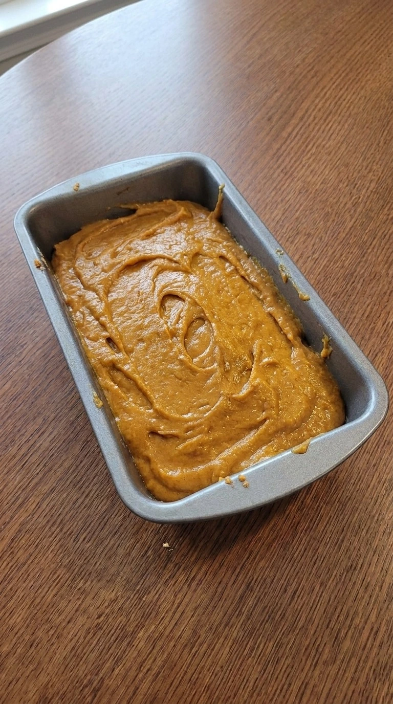 Pumpkin Bread with Cake Mix Boxes batter poured into loaf pan before baking Recipe focus: 3 ingredient pumpkin bread.