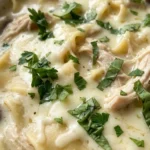 White Chicken Lasagna Soup with creamy broth chicken and lasagna noodles in bowl Recipe focus: white lasagna soup. Recipe focus: alfredo lasagna soup.