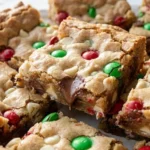 Christmas Cookie Bars sliced into homemade squares with colorful candy pieces Recipe focus: cookie bars christmas.