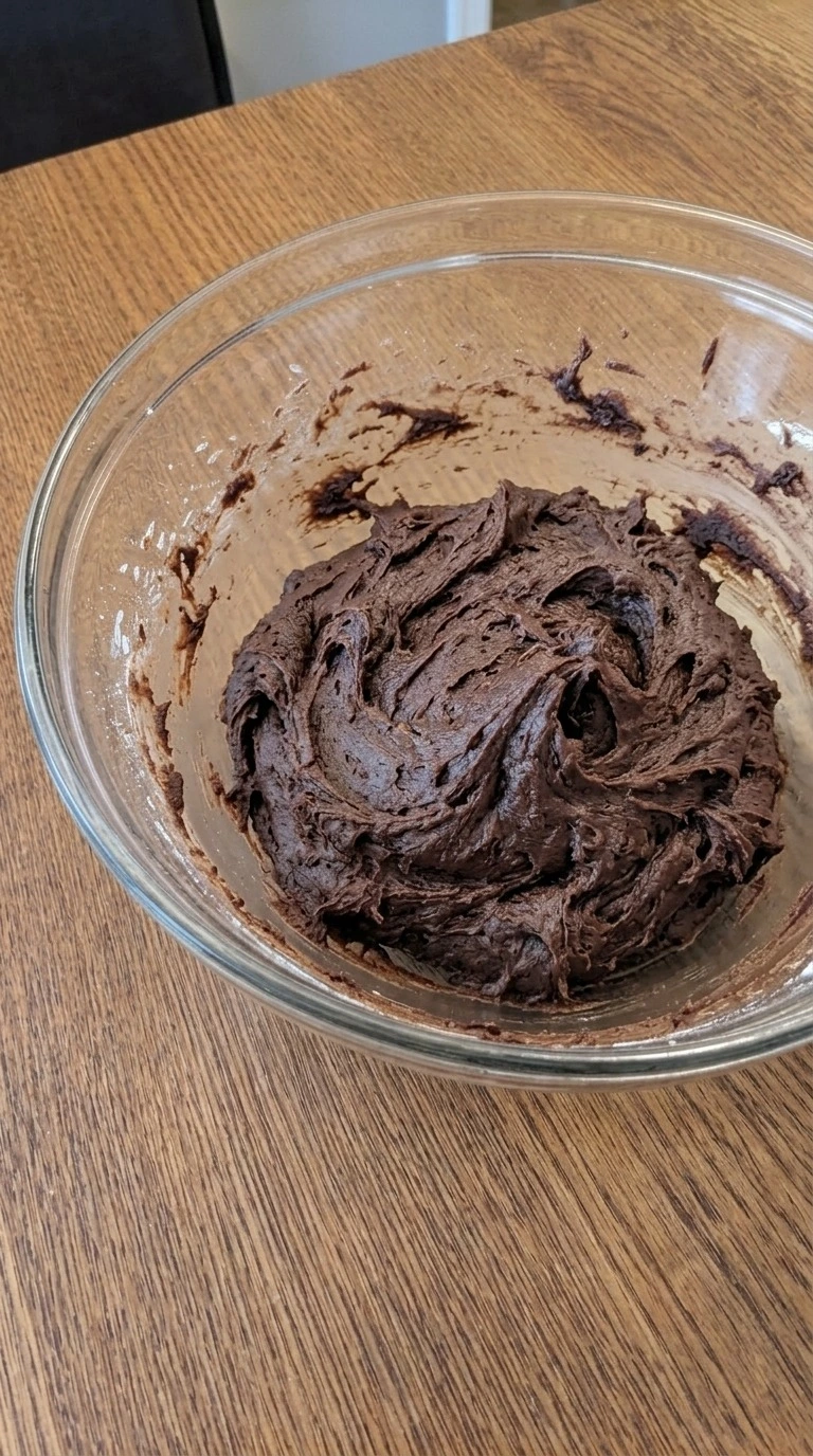 Christmas Crinkle Cookies thick dark chocolate dough after cocoa powder and flour have been folded in. Recipe focus: christmas crinkle cookies easy.