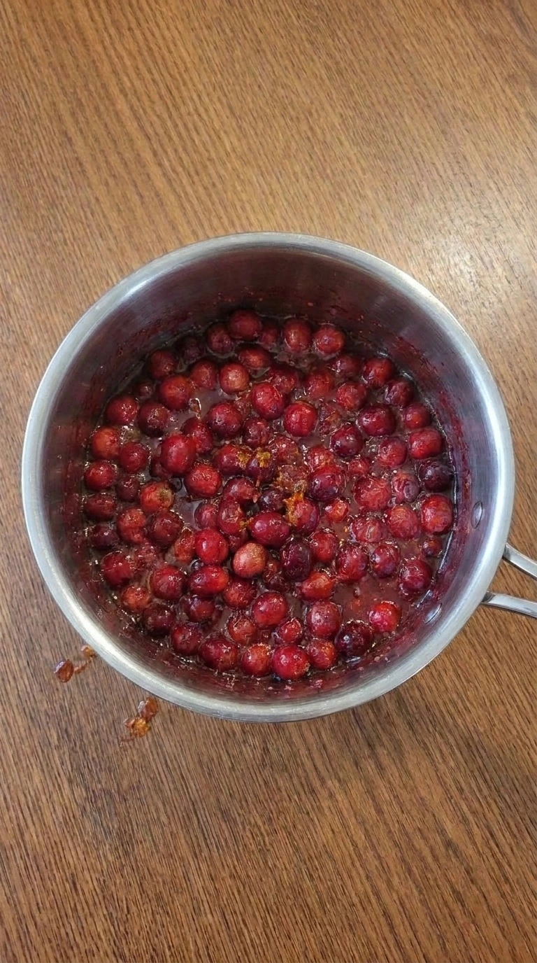 Simmer Until the Cranberries Burst and Thicken Recipe focus: thanksgiving cranberry orange sauce.