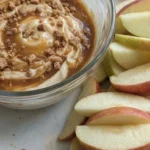 Cream Cheese Caramel Apple Dip with caramel layers and apple slices served fresh Recipe focus: caramel apple cheesecake dip.