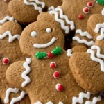 Gingerbread Man Cookies finished with icing details and golden edges Recipe focus: gingerbread cookies.