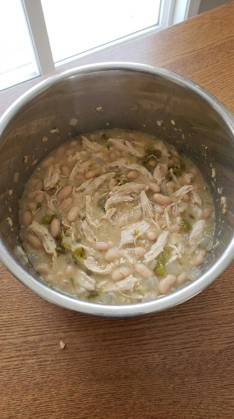 Instant Pot White Chicken Chili creamy finish with melted cheese and beans Recipe focus: crockpot white chicken chili.