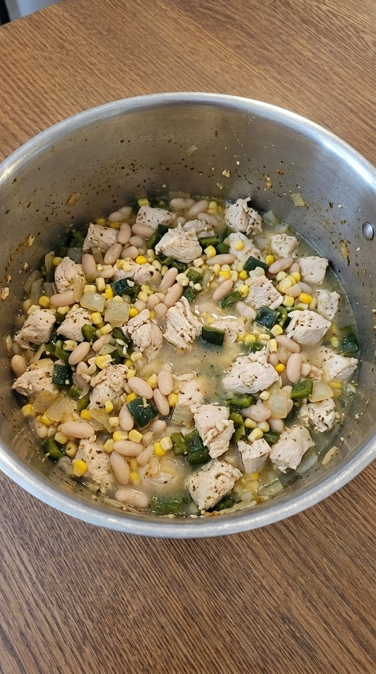 Mexican Street Corn White Chicken Chili simmering with chicken beans and sweet corn Recipe focus: crockpot white chicken chili.