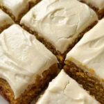 Pumpkin Bars with Cream Cheese Frosting sliced squares with creamy topping Recipe focus: pumpkin bars recipe.